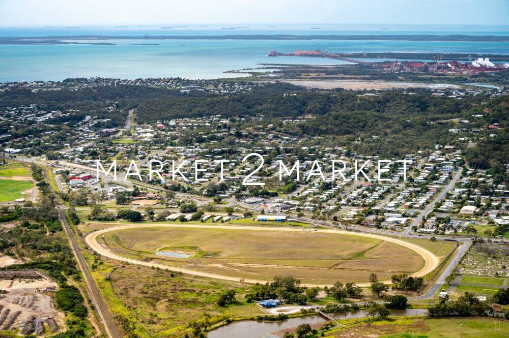 Aerial view of Gladstone race course with residential area