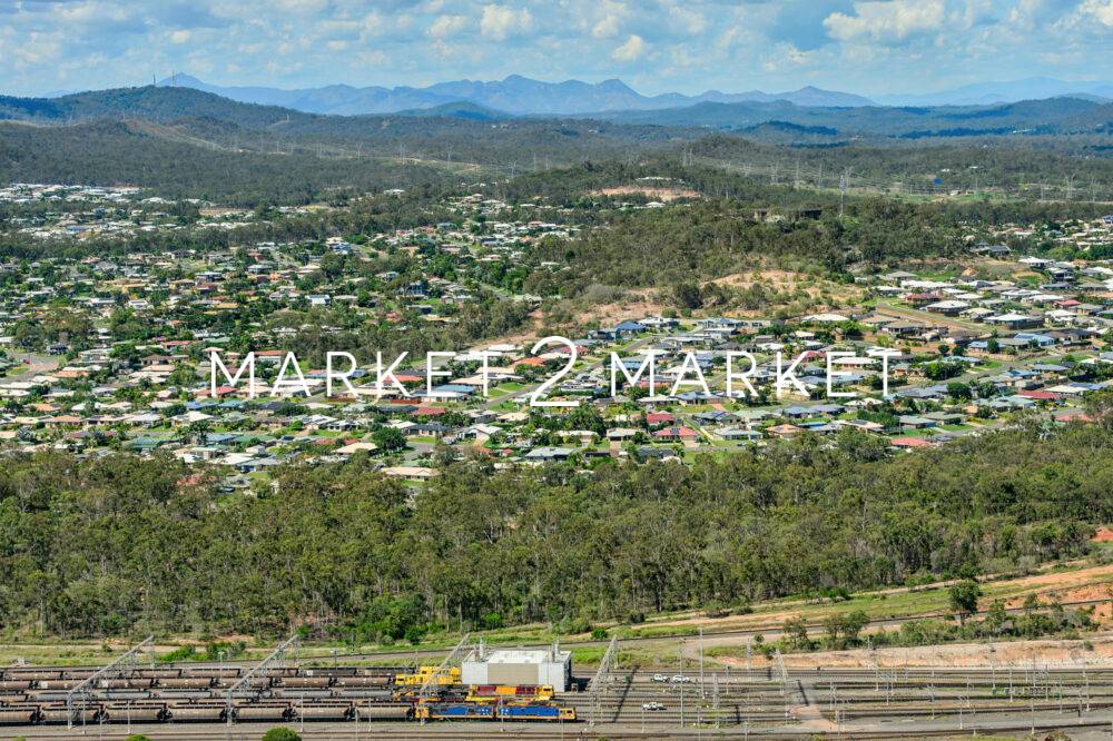 View towards Clinton suburb with coal trains in the foreground,