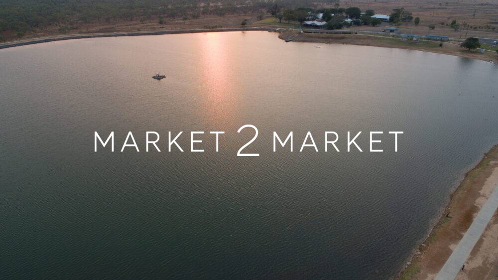 Aerial view of small lake and regional properties in North Queensland at Dusk