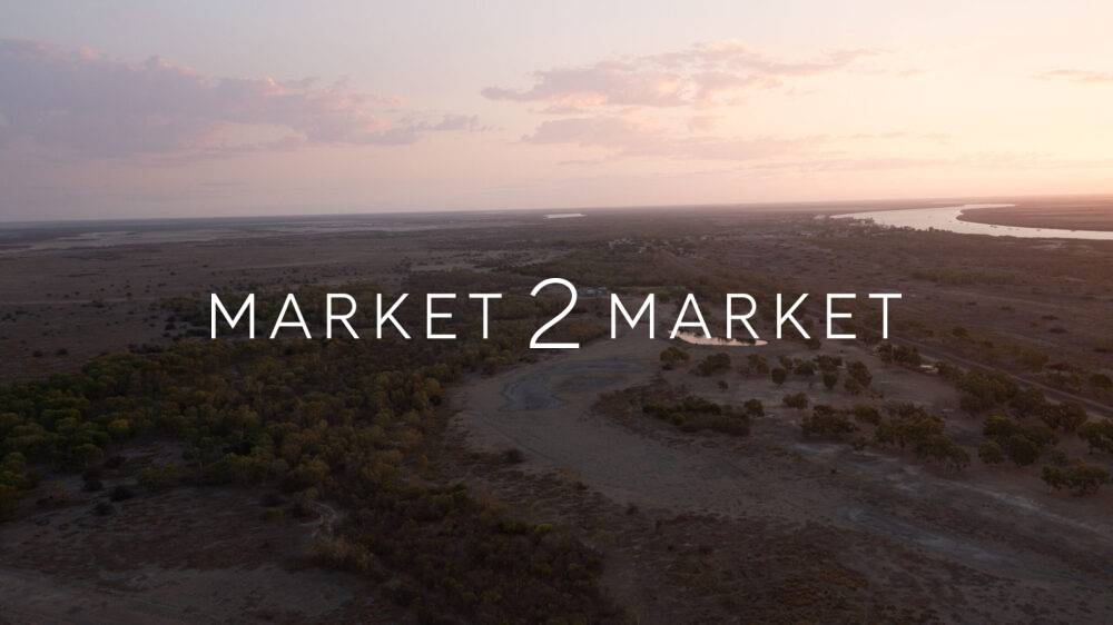 Aerial View over Waterway in Outback Landscape at Dusk