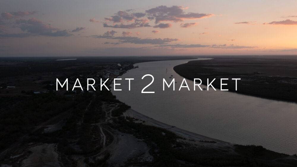 Aerial View over Waterway in Outback Landscape at Dusk